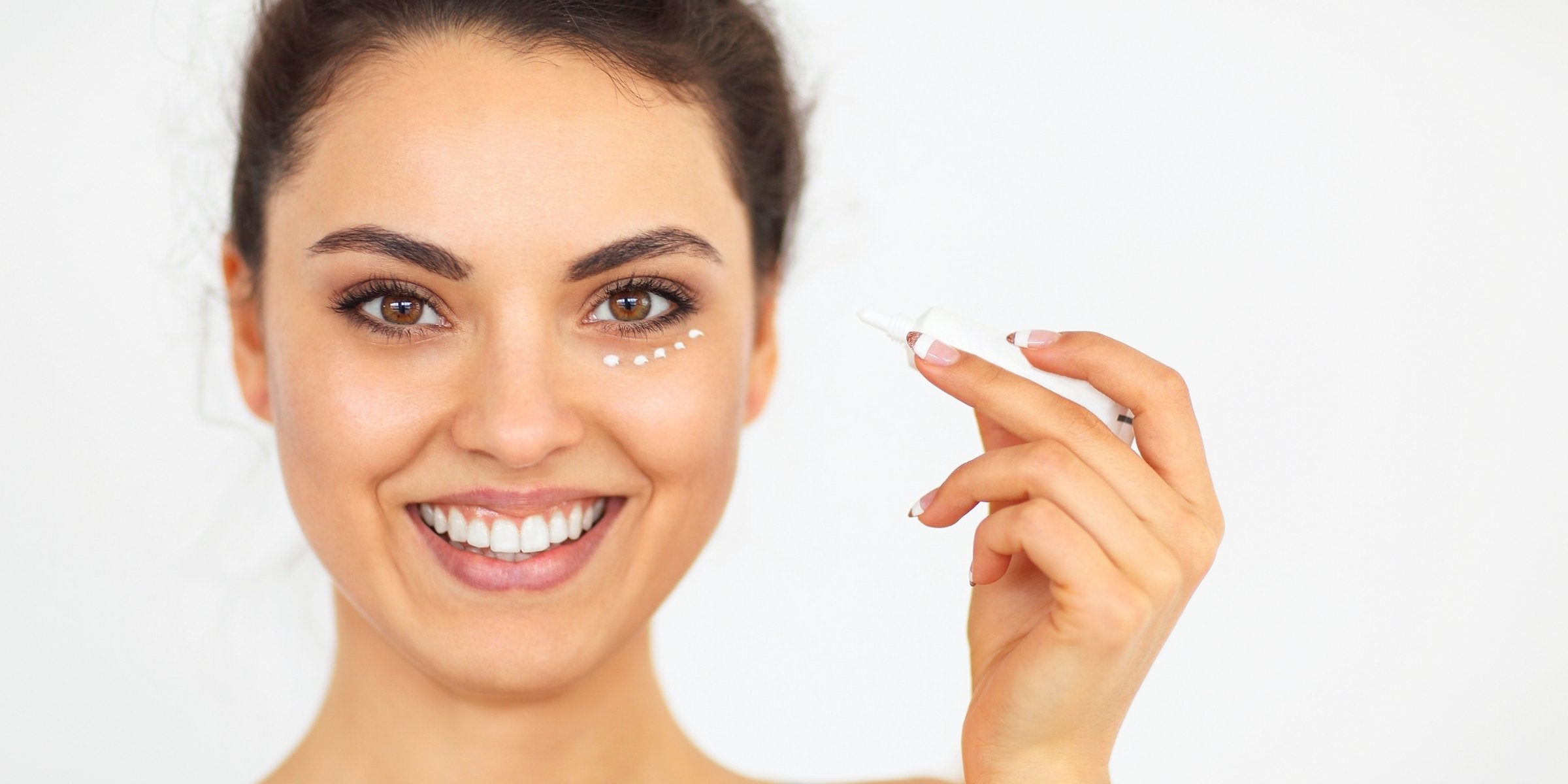 lady applying eye cream