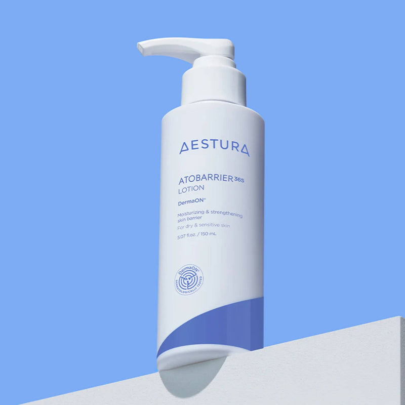 Aestura Atobarrier 365 Lotion bottle on a blue background