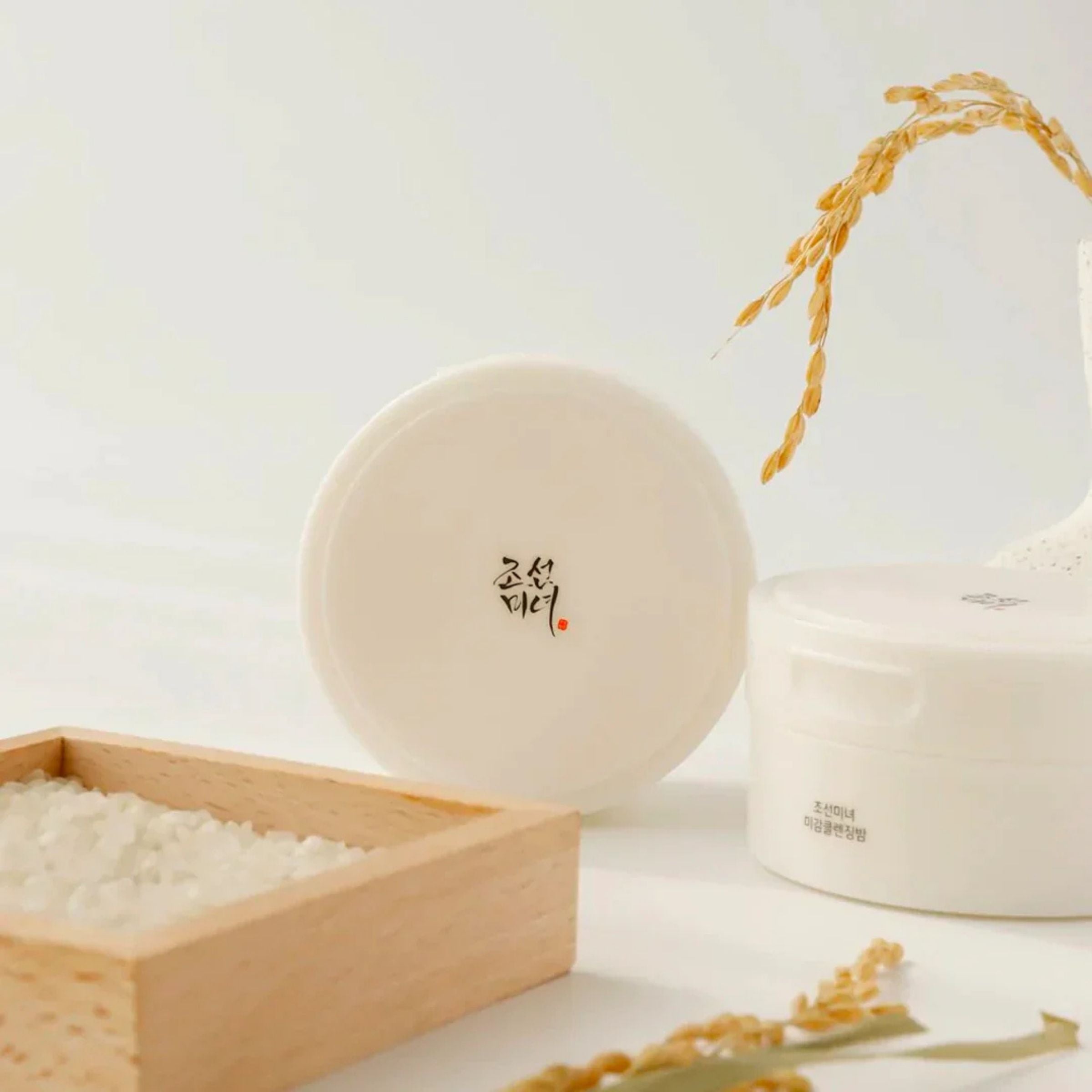 Round white product with Korean text on a light background