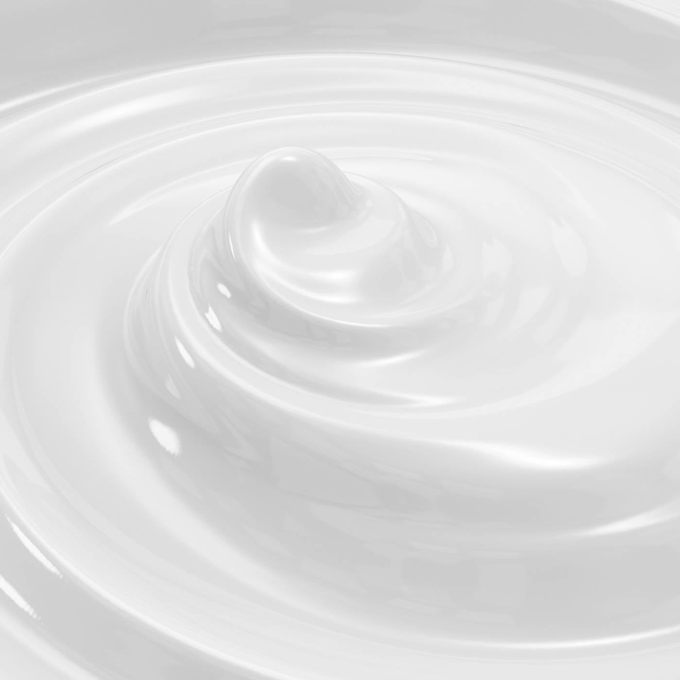 Close-up of white moisturizer lotion with a swirl texture on a light gray background