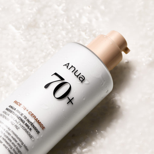 Anua 70+ skincare product on a textured white background