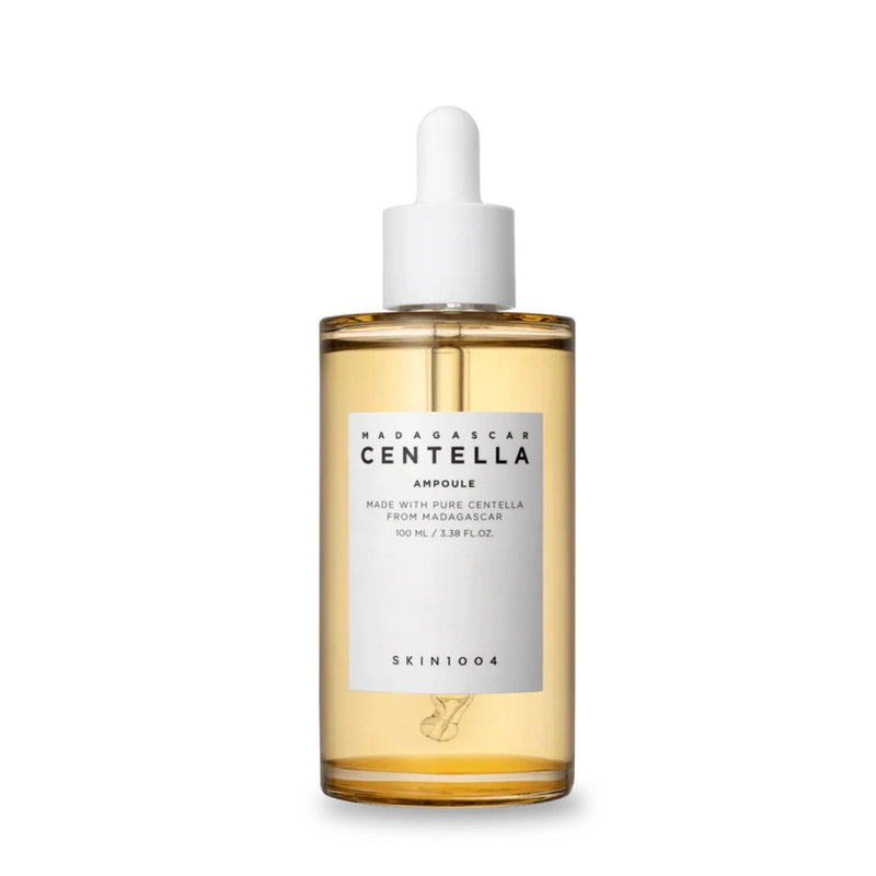 Bottle of Madagascar Centella Ampoule with a white dropper on a white background