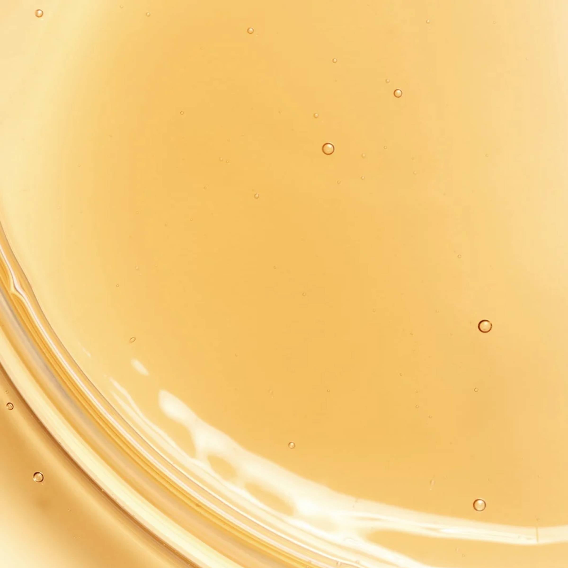 Close-up of a smooth, beige-colored surface with subtle variations in texture.