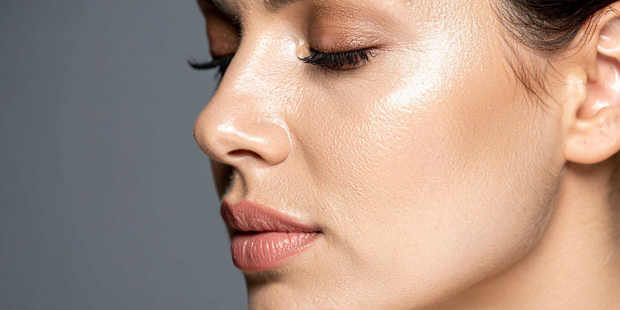 Close-up of a woman's face with a neutral background