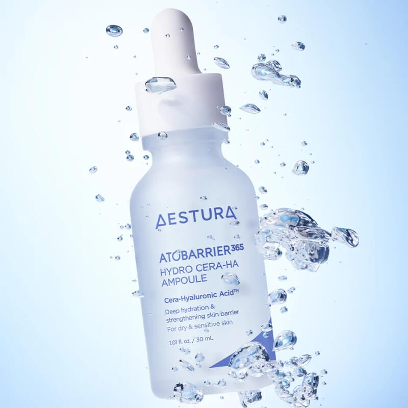 Aestura Atobarrier 365 Hydro Cera-HA Serum with water droplets on a light blue background