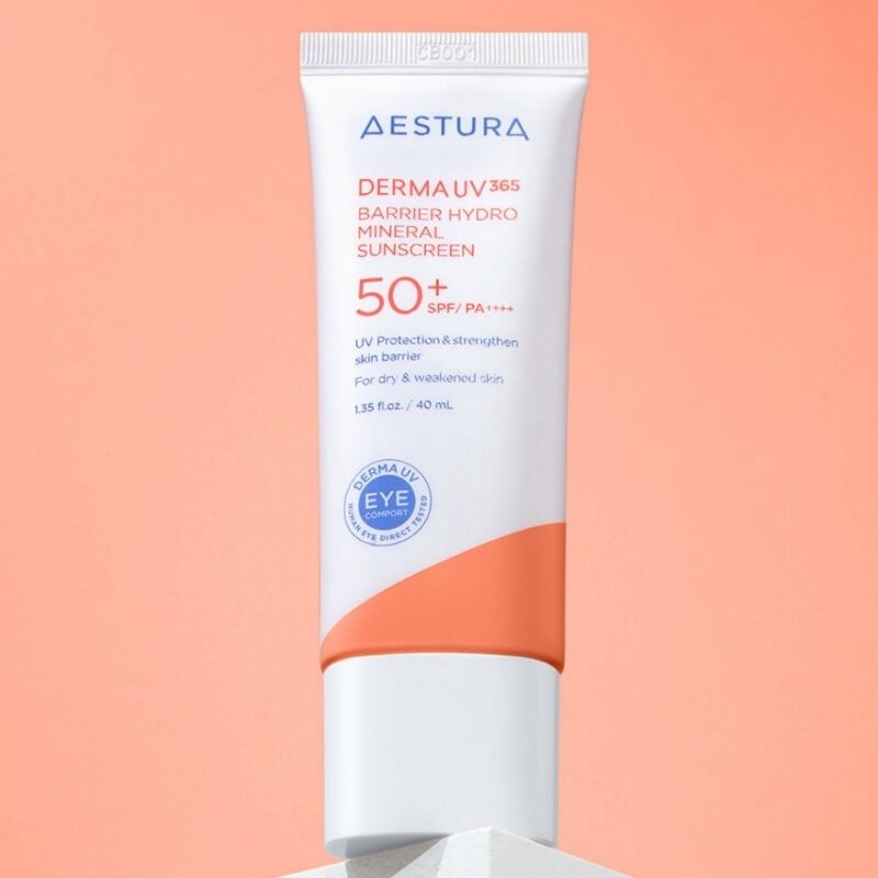 Aestura Derma UV365 Barrier Hydro Mineral Sunscreen tube on a peach background