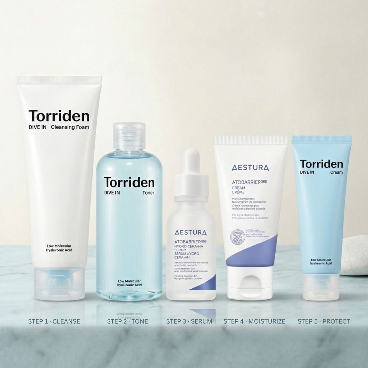 Korean skincare products for hydration routine on marble surface