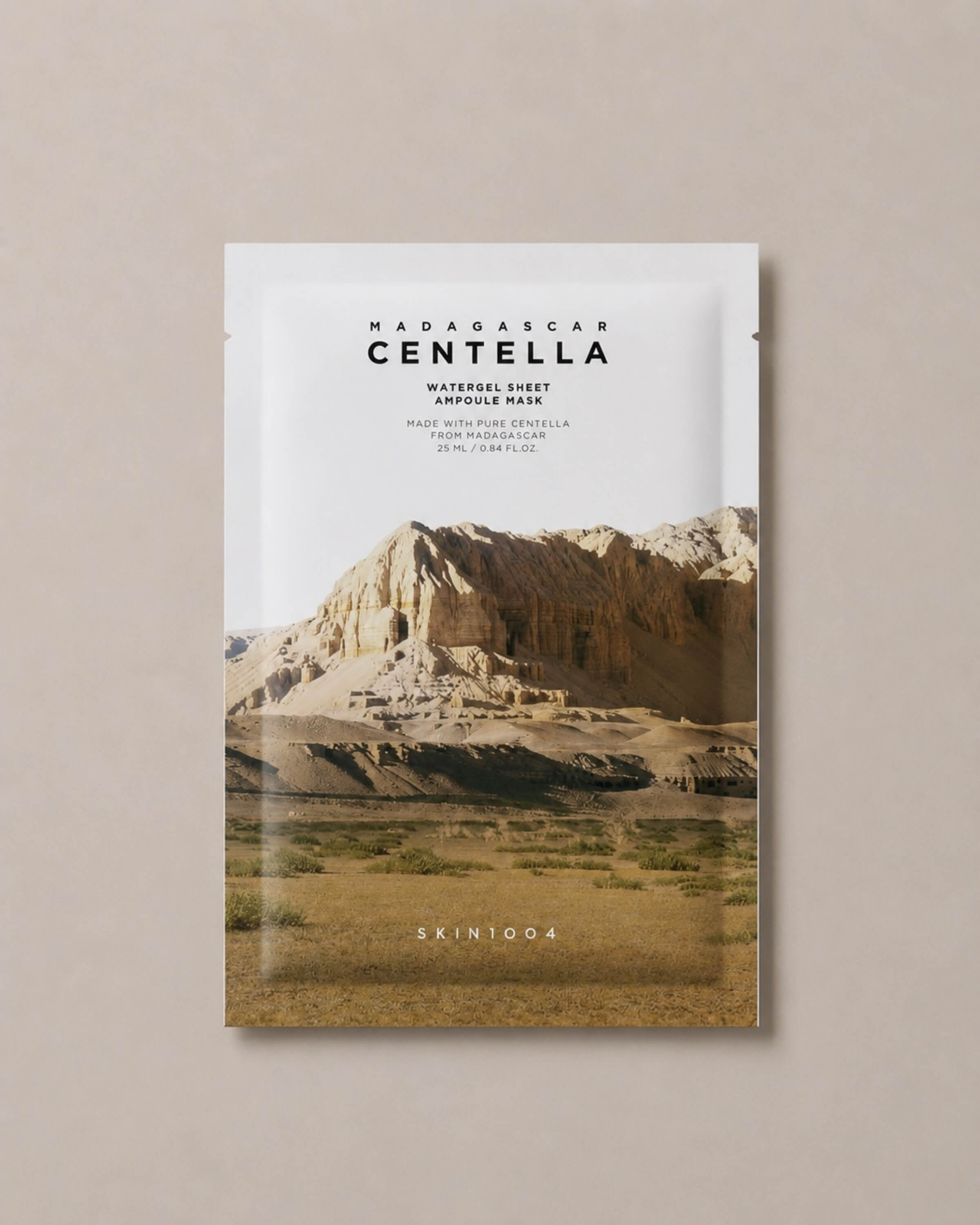 Skin1004 mask packaging with mountain landscape on a beige background