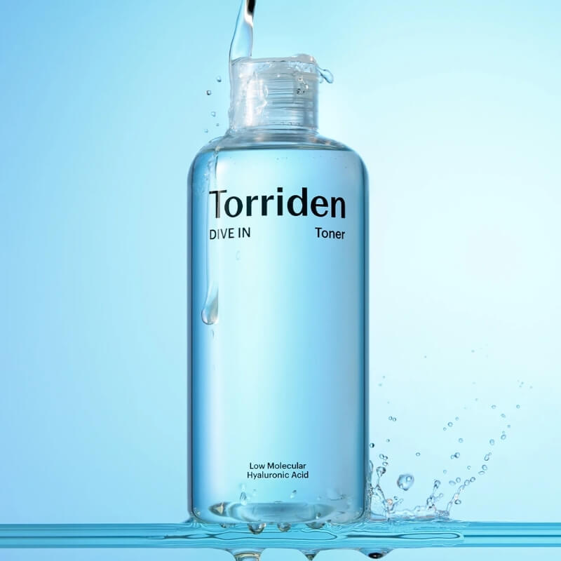 Torriden Dive In Hyaluronic Acid Toner with water droplet on a blue background
