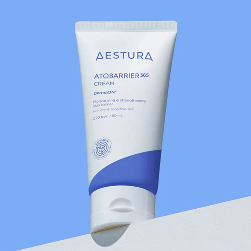 Tube of Aestura Atobarrier 365 Cream on a blue background