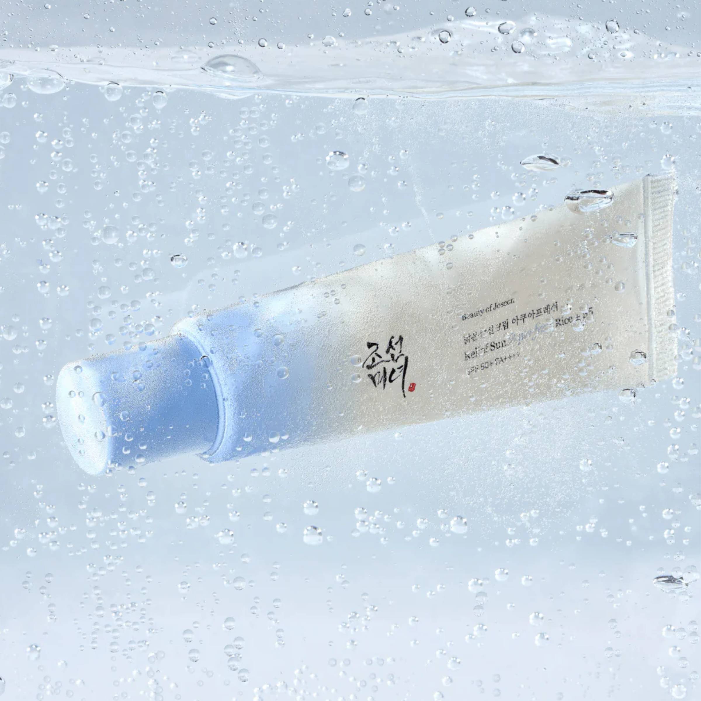 Tube of cream on a textured gray background