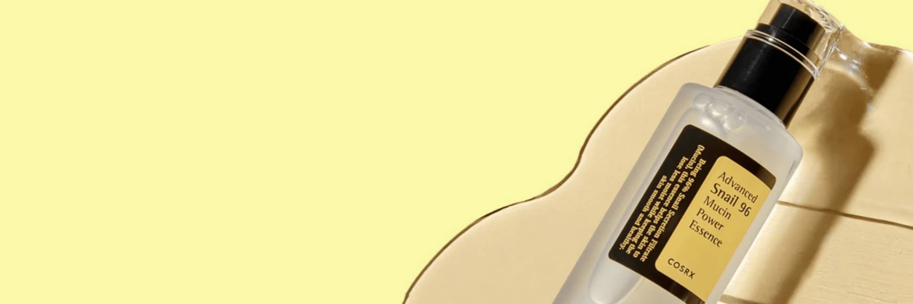 COSRX skincare bottle with pump on a beige background