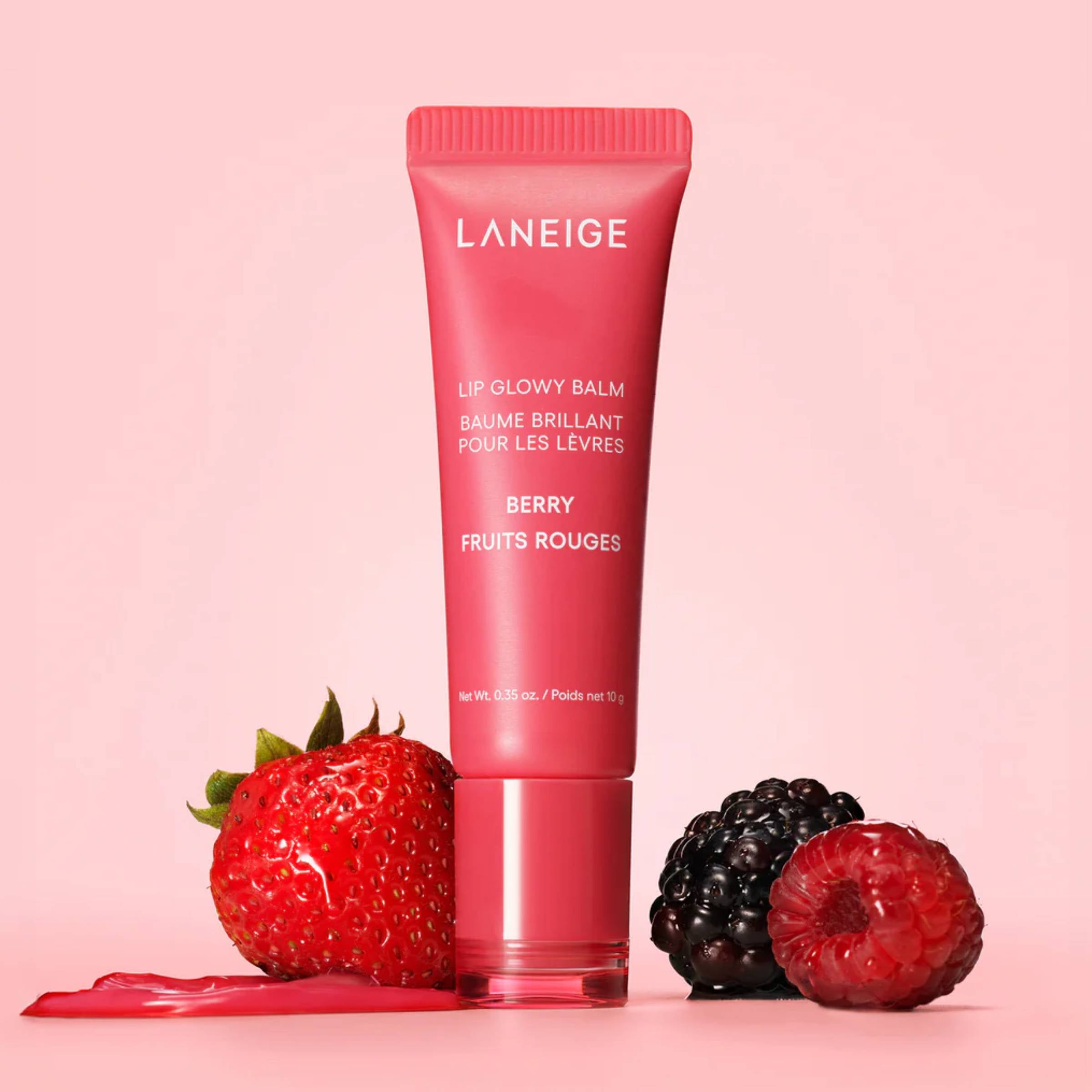 Laneige lip balm tube with berries on a pink background