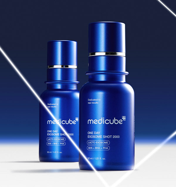 Two blue bottles of Medicube skincare product on a gradient blue background