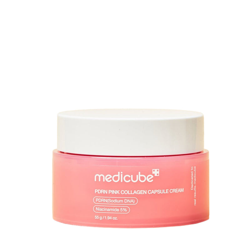 Pink jar of Medicube cream with a white lid on a white background