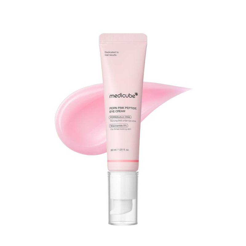 Pink Medicube PDRN eye cream tube with pink smear on a white background