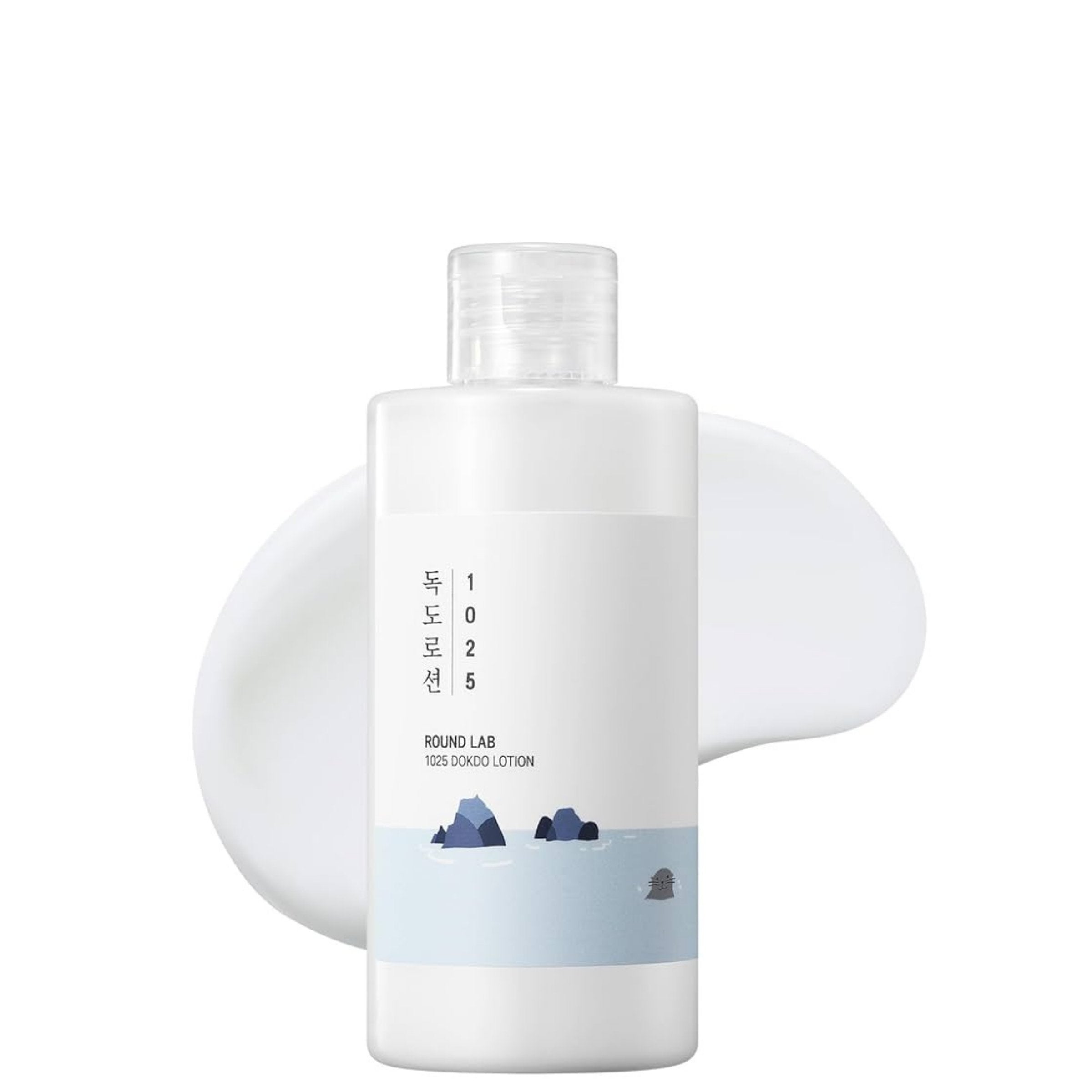 White bottle with blue label on a white background