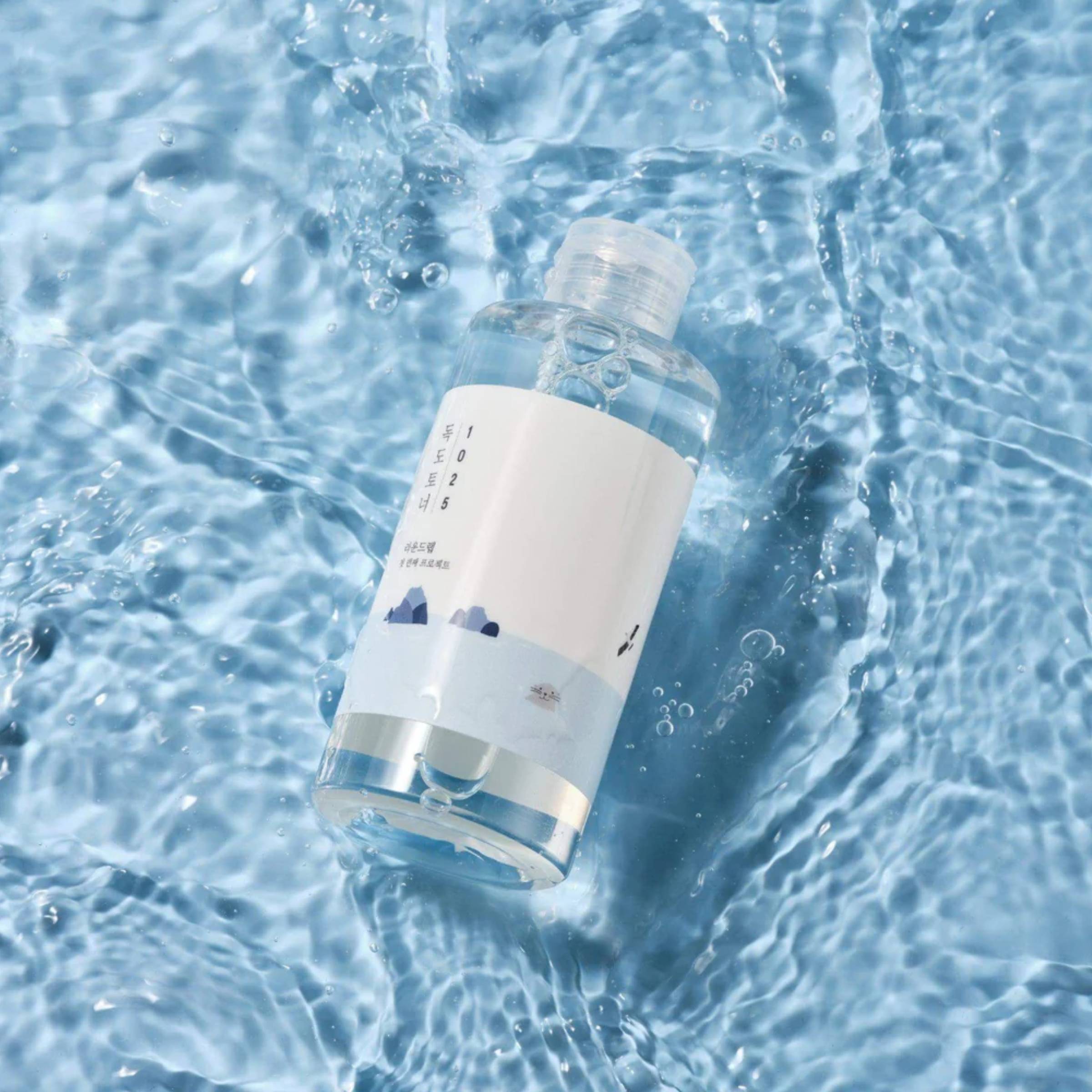 Round Lab 1025 Dokdo Toner bottle floating on water