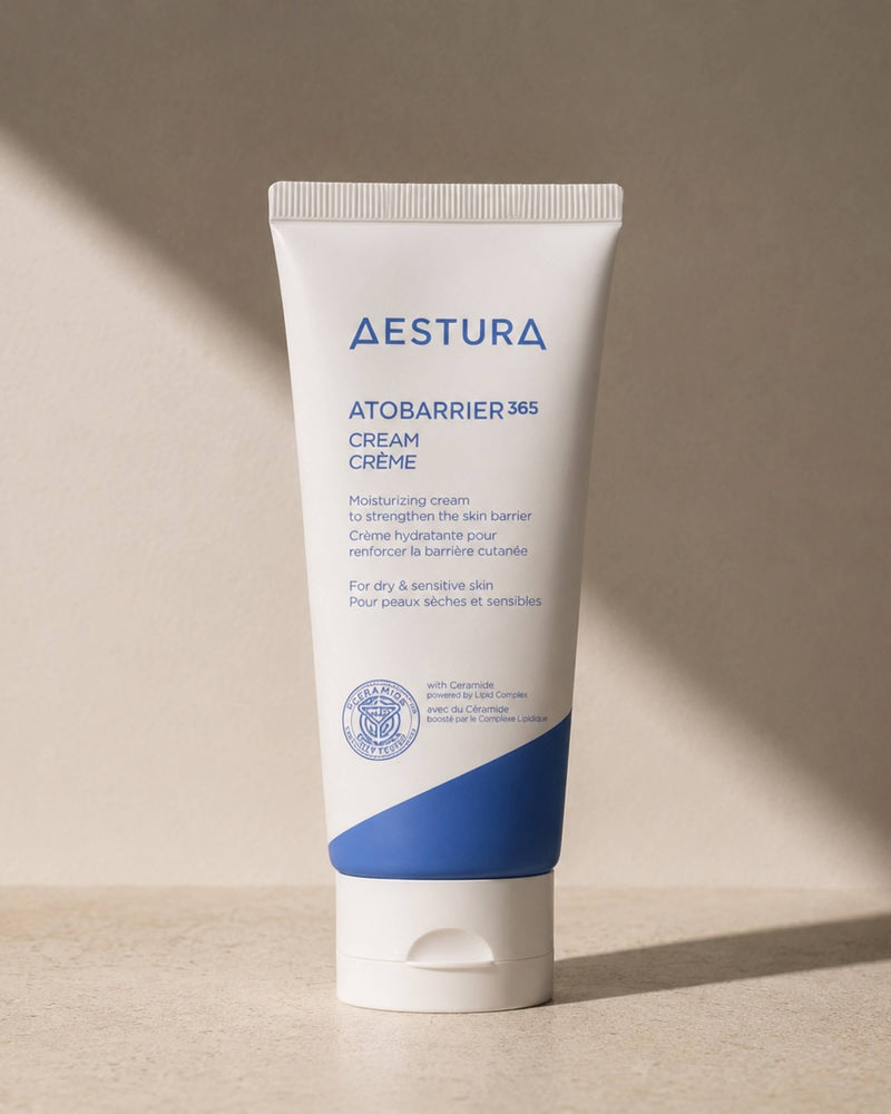 Aestura Atobarrier 365 Cream tube on a beige background