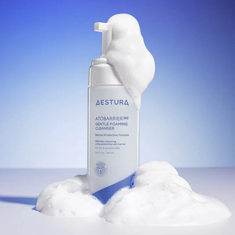 Aestura Atobarrier 365 Gentle Foaming Cleanser with foam on a blue gradient background