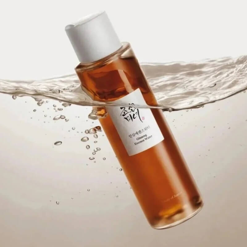 Beauty of Joseon Ginseng Essence Water in K-beauty anti-aging glow routine with water splash on a neutral background
