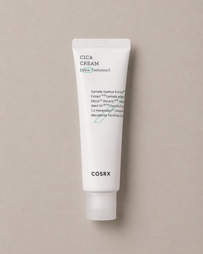 Cosrx Cica Cream tube on a beige background