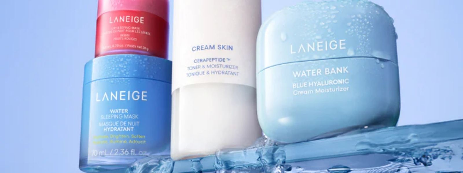 LANEIGE skincare products including a bottle, cream, and jar on a blue background
