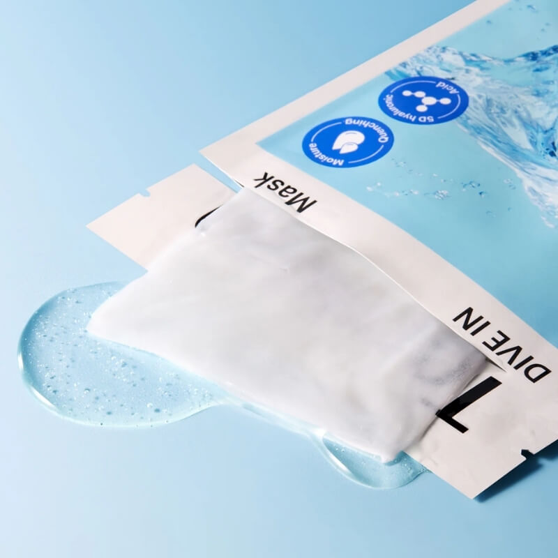 Torriden Dive In Hyaluronic Acid Mask texture close up on a light blue background