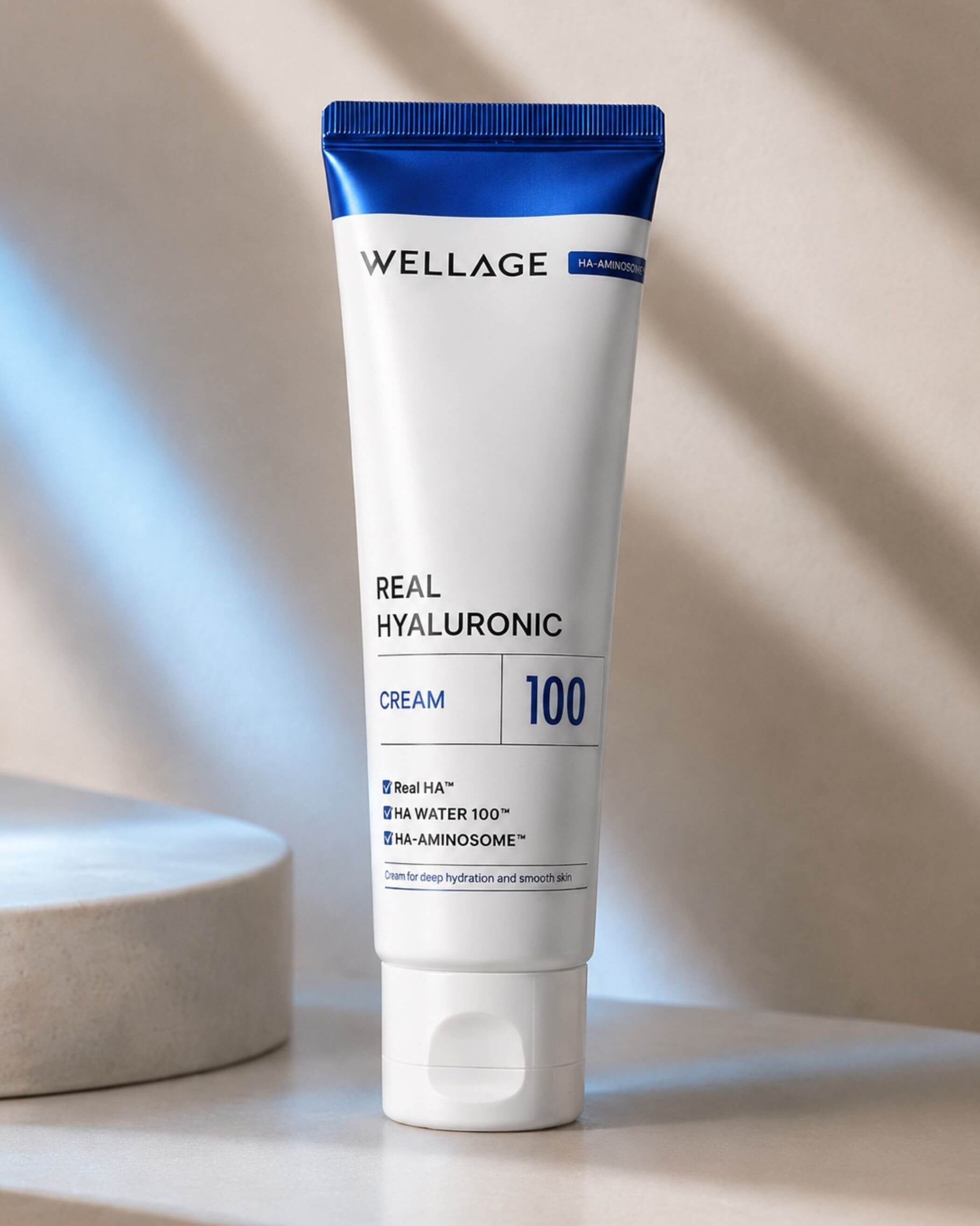 Tube of Wellage Real Hyaluronic Cream 100 on a neutral background