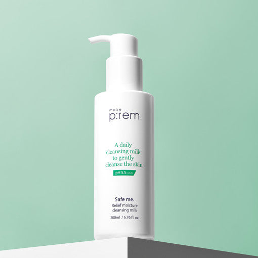 White bottle of p:rem cleansing milk on a light green background